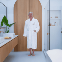 Man in a Raul E Zen robe in a calm sunlit room